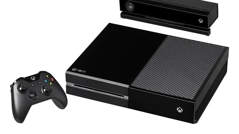 современная игровая консоль Xbox на темном столе